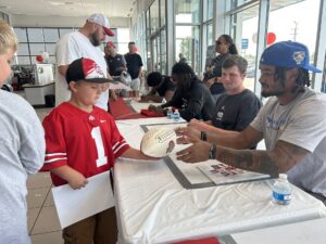 Seven Ohio State Buckeyes sign name, image and likeness deal with Mark Wahlberg Auto Group